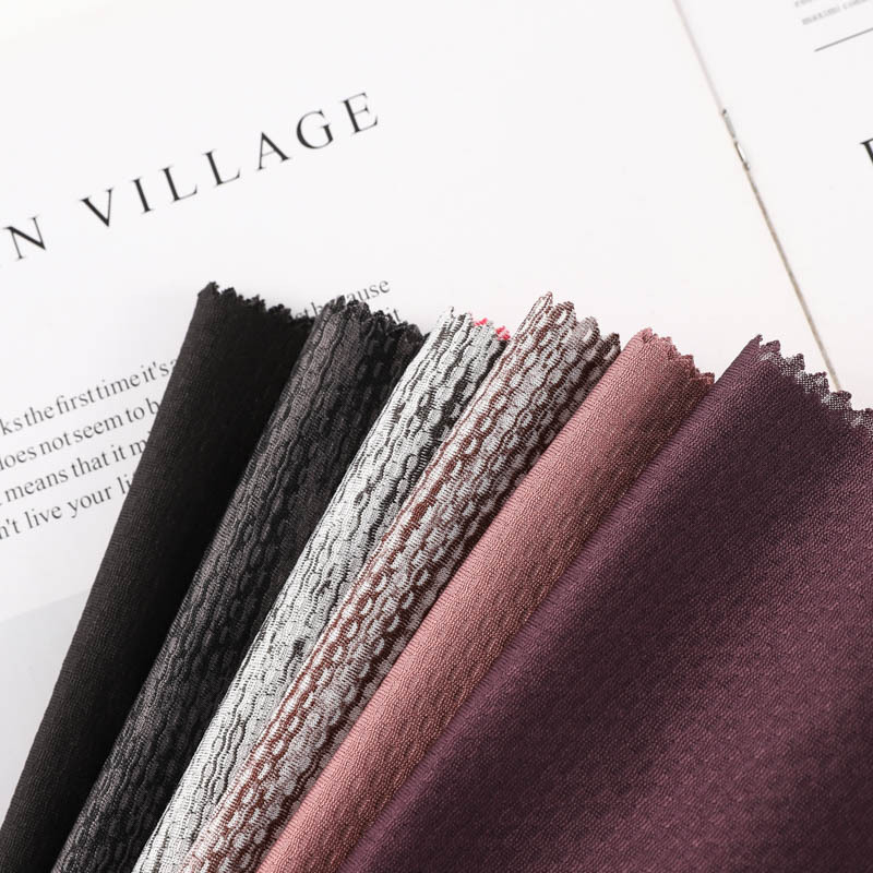 135克阳涤网眼提花，透气针织运动面料，针织运动面料现货