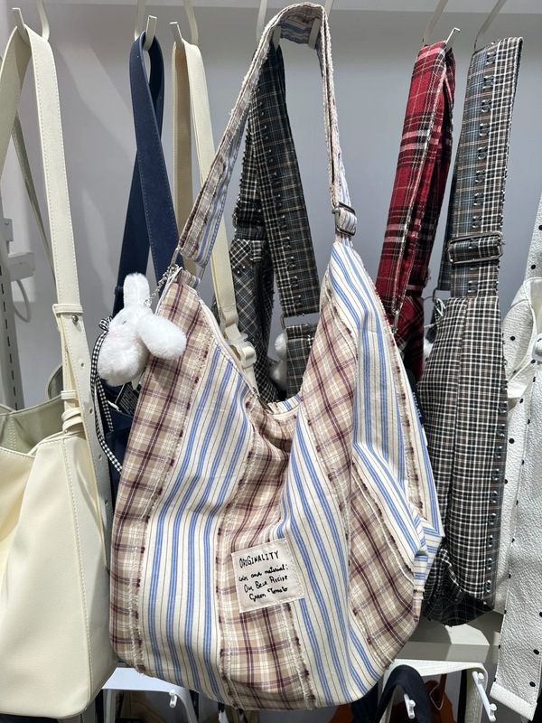 韓国ピンクヒョウ柄キャンバスバッグ女性のための 2025 新しい大容量通勤トートバッグニッチショルダークロスボディバッグ|undefined