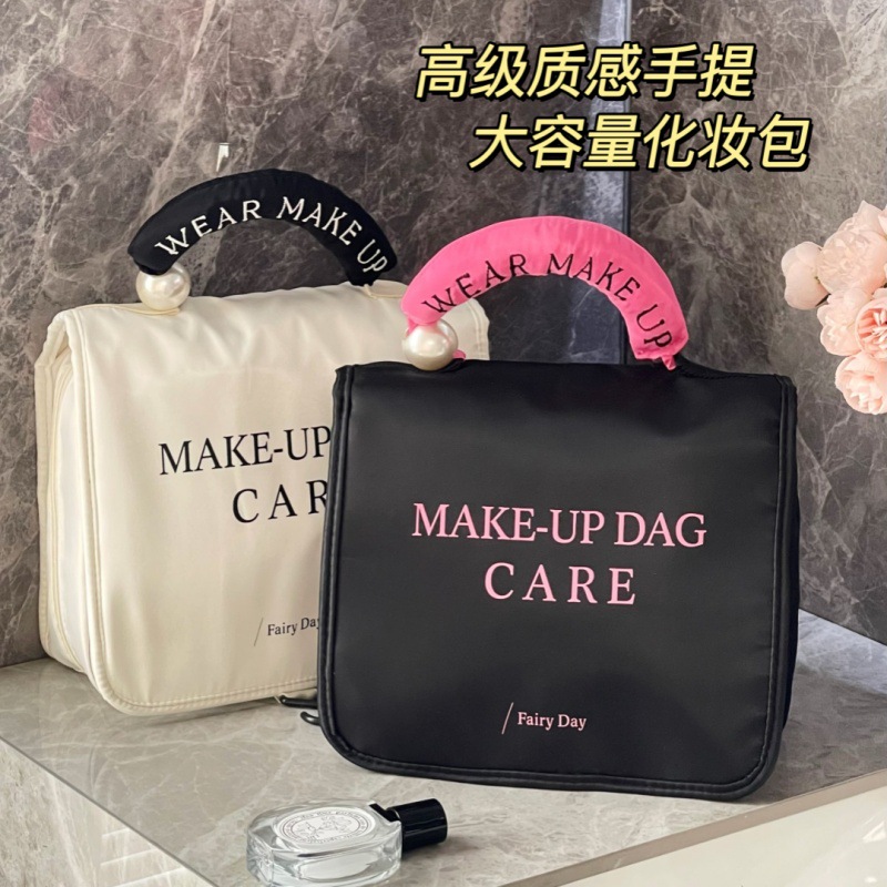 2024 nueva bolsa de cosméticos para mujer sensación portátil portátil de gran capacidad para viajes de negocios almacenamiento de cosméticos bolsa de lavado al por mayor