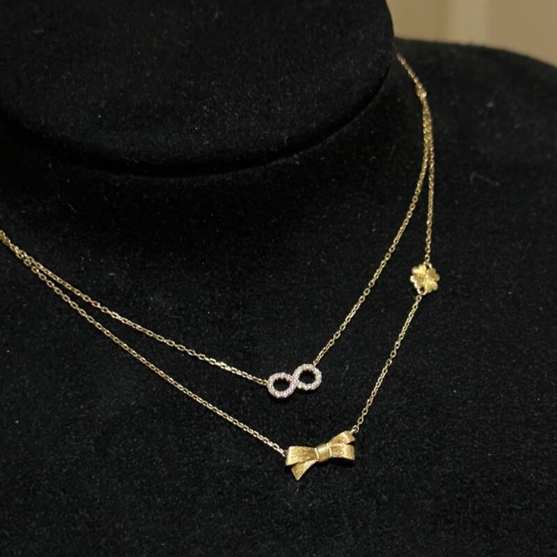 Elegant and Sophisticated High-End Bowknot Necklace with Diamond-Encrusted Infinity Symbol, Double-Layered Hollow-Out Clavicle Chain Elegant and Sophisticated High-End Bowknot Necklace with Diamond-Encrusted Infinity Symbol, Double-Layered Hollow-Out Clavicle Chain