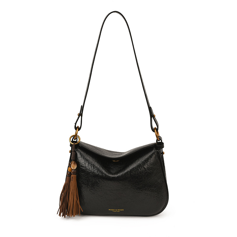 Retro 2025 invierno nuevo estilo de alta sensación de moda bolso de hombro de moda bolso pequeño de tendencia de mujer de viaje versátil bolso de mochila