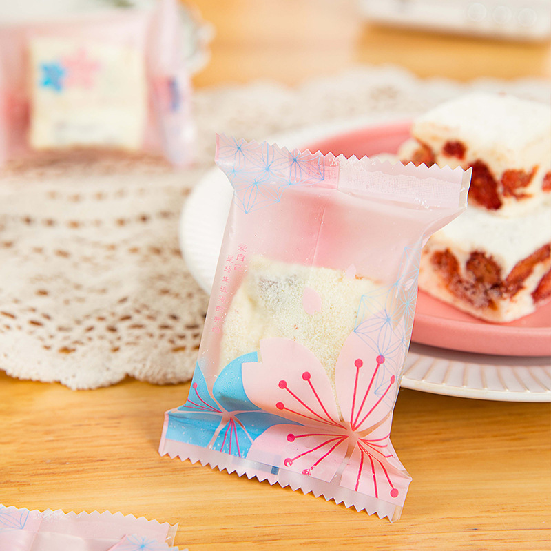 Copo de nieve de poliéster máquina crujiente sello autosellante embalaje turrón galleta embalaje transparente azufaifo leche bolsa de embalaje 100 piezas
