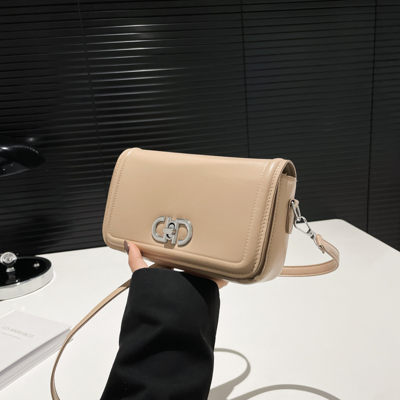 2025 primavera nuevo nicho de estilo estilo extranjero estilo de moda de color sólido bolso de bloqueo personalidad elegante bolso de hombro