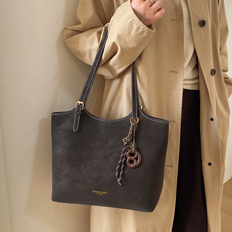 Bolsa de gran capacidad para mujeres 2026 nueva moda bolso de hombro de mujer alta textura versátil bolso de mujer de viaje mate