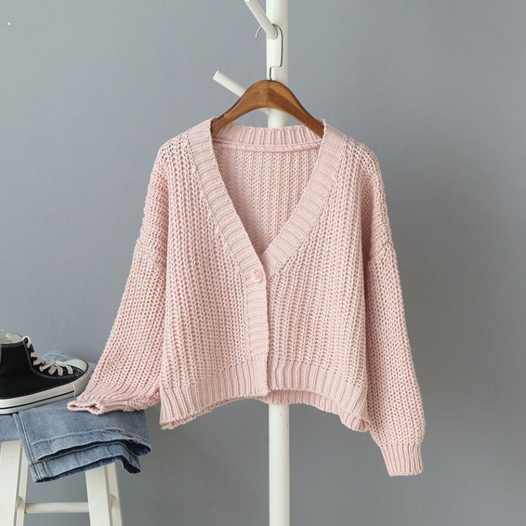 Comercio exterior de otoño suministro transfronterizo de ropa de mujer europea y americana botón de punto de manga larga cardigán de color sólido suéter suelto de cuello en V