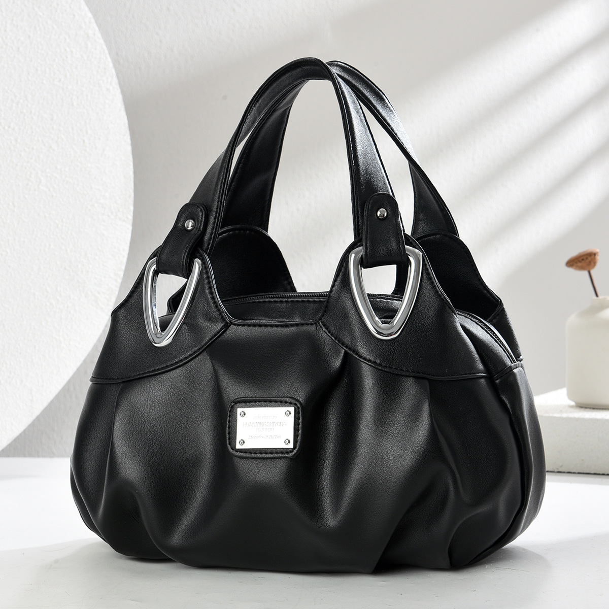 2025 nuevo estilo de moda de madres de mediana edad bolso de mano temperamento bolso de madre bolso de hombro de moda europea y americana