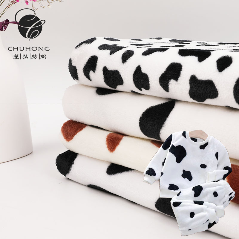 厂家供应 双面法兰绒珊瑚绒印花奶牛斑 睡衣毯子靠枕绒布面料