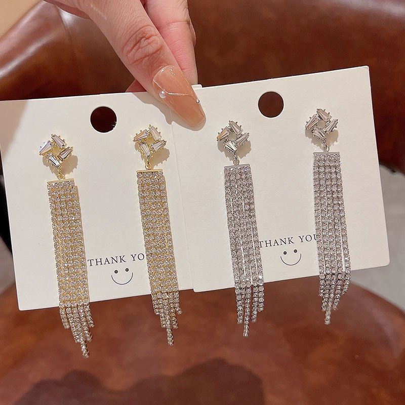 Europa y los Estados Unidos de largo diamante flash personalidad pendientes de diamante de frisa de moda femenina temperamento universal rojo en línea los mismos pendientes de orejas
