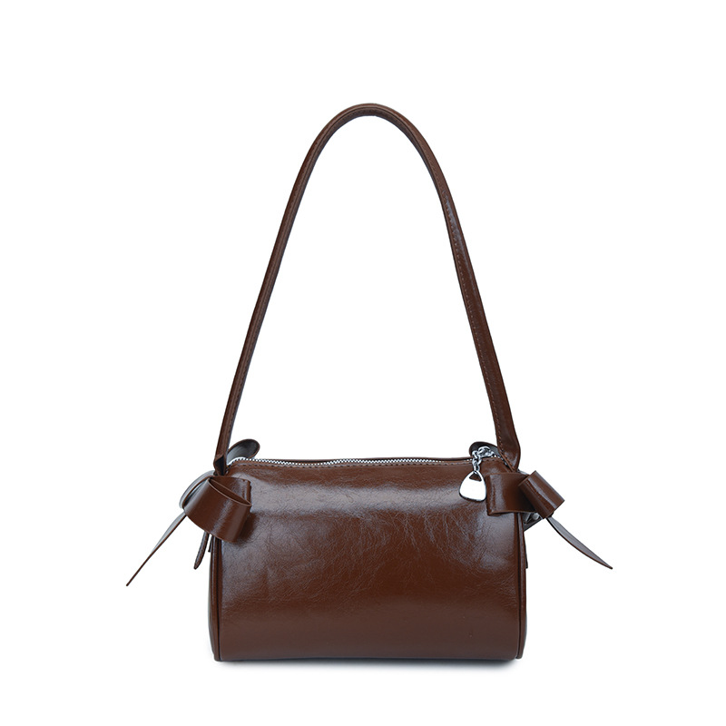 Bolsos de brazo de arco de arco de aire extranjero diarios para mujeres verano 2026 nuevo tipo de lujo ligero versátil bolso de hombro de viaje image 9