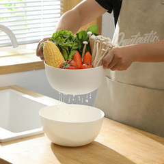 新型の水たまりの米のとぎかごは厚い円形の台所の果物と野菜のかごの二重の水洗いの野菜のかごの家庭用の野菜の鉢を洗います。