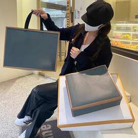 金边防水无纺布手提袋服装店打包衣服用礼品包装购物袋子可印LOGO