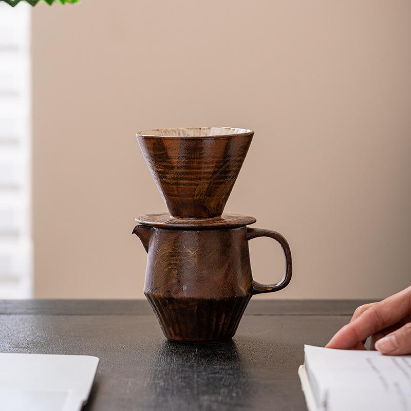 Pink-colored, rustic-style pour-over coffee pot set, including a funnel for filtering coffee and tea, a ceramic coffee cup, and a sharing pot for the office Pink-colored, rustic-style pour-over coffee pot set, including a funnel for filtering coffee and tea, a ceramic coffee cup, and a sharing pot for the office