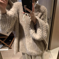 YUNSHUの怠惰な風がゆったりしていて、丸首のランタンの袖のセーターの女性の秋冬の純色の縦のピットの大きいサイズのニット