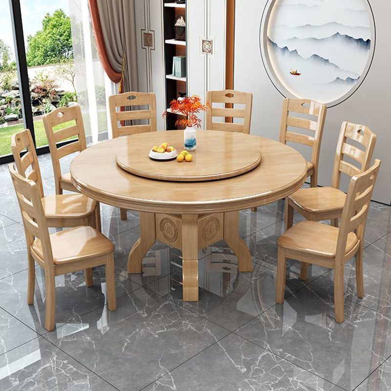 Chinese-style solid wood round dining table, suitable for home use, with a built-in induction cooktop and rotating tray, also available as a hotel-style carved round dining table