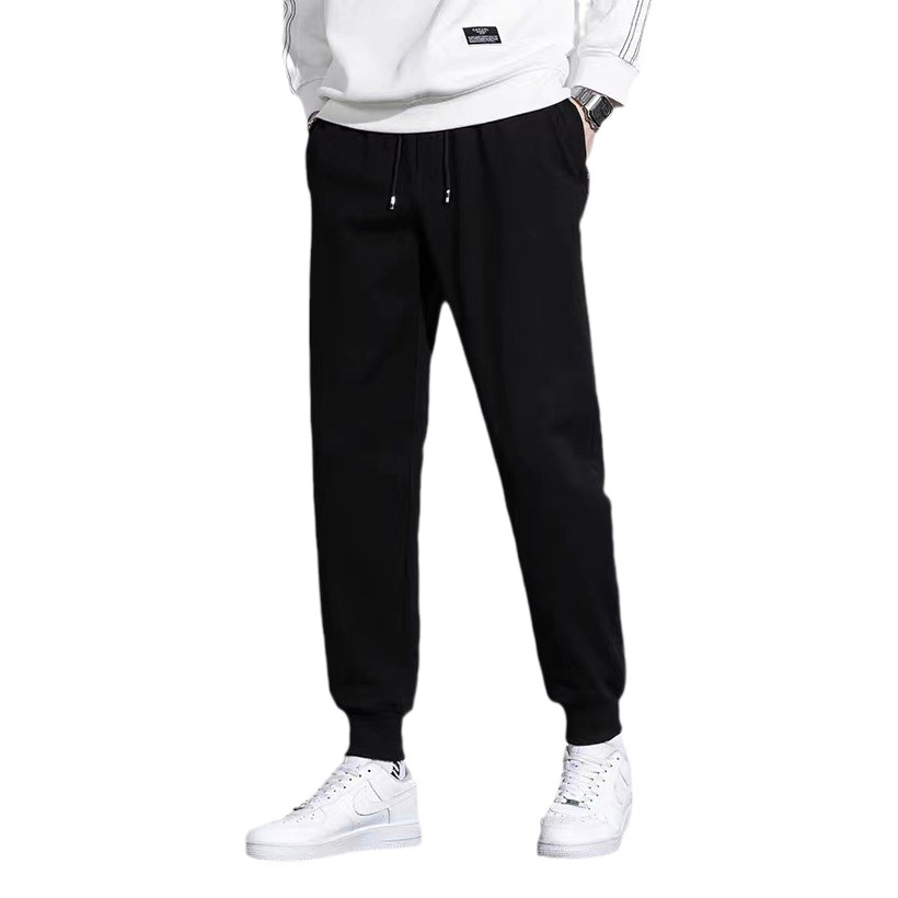 Pantalones deportivos pantalones para hombres 2025 primavera y otoño nuevo estilo recto negro suelto casual de punto para hombres pantalones de baloncesto para correr