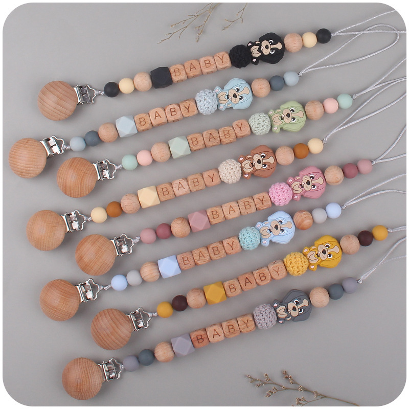 Nuevo bebé suministros de haya chupete clip calmante bebé de dibujos animados animal perro silicona chupete cadena anti-gota cadena