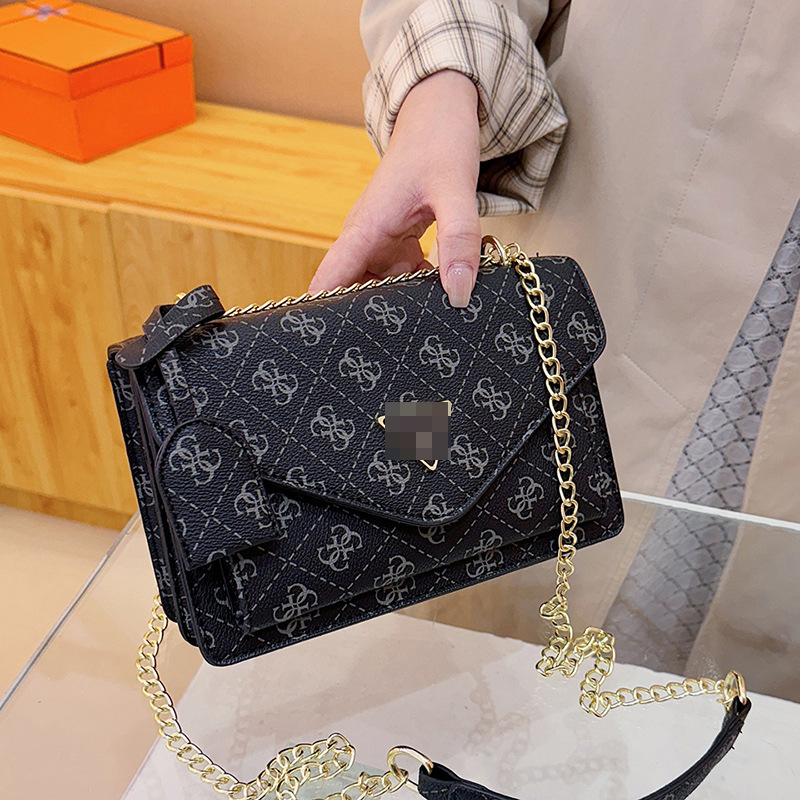 Bolsos transfronterizos 2024 nuevo bolso cuadrado pequeño rombo de sentido avanzado de la tendencia Bolso bandolera con letras impresas de moda de estilo europeo y americano