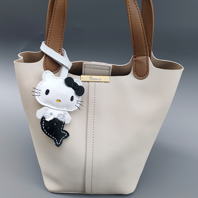 黑皮美人鱼真皮皮包公仔可爱夏威夷真皮包玩偶挂件挂饰hellokitty|undefined