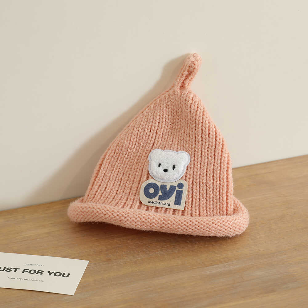 2024 otoño y invierno nuevo unisex lindo sombrero de punto de cabeza de oso simple sombrero de lana casual universal