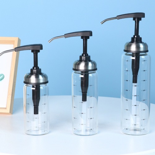 A glass oyster sauce bottle presser for home use, a tomato salad sauce presser, an oil presser 