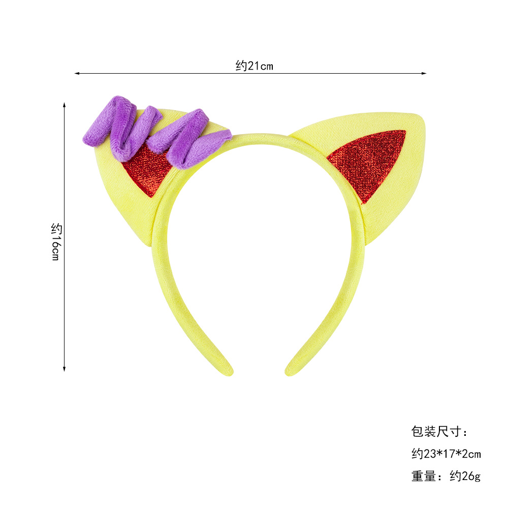 Almohada amarilla orejas de gato