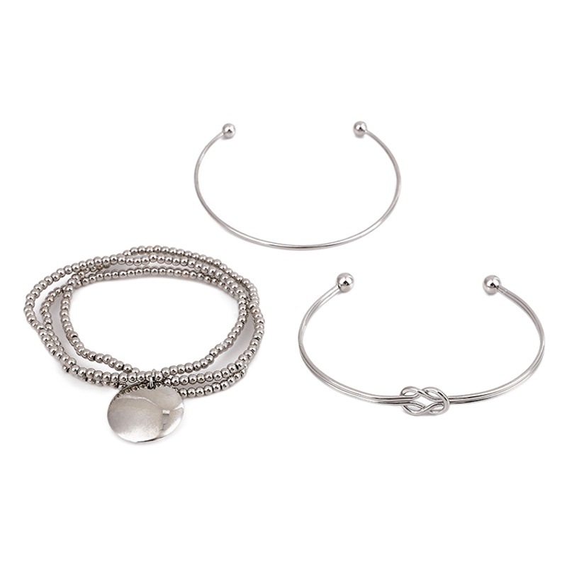Conjunto de tres pulseras de plata brillante estilo europeo y americano con nudo en forma de ocho, pulsera de cuentas de arroz de una sola pieza para mujer, pulsera de plata brillante.