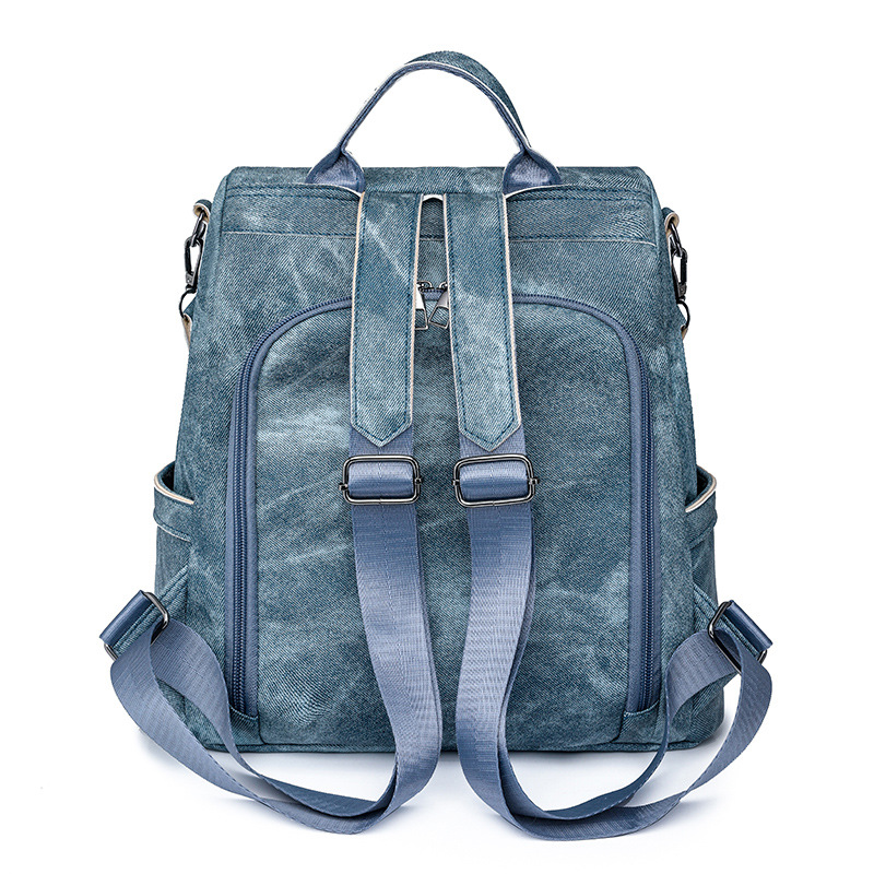 2024 nueva mochila antirrobo casual de color sólido para mujer simple retro al aire libre mochila de viaje ligero de doble uso marea