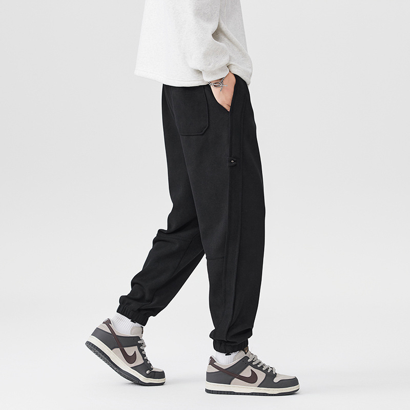 2025 otoño y invierno nuevos pantalones negros para hombres sueltos pantalones deportivos casuales de cintura elástica de tamaño grande con etiquetas colgantes image 4