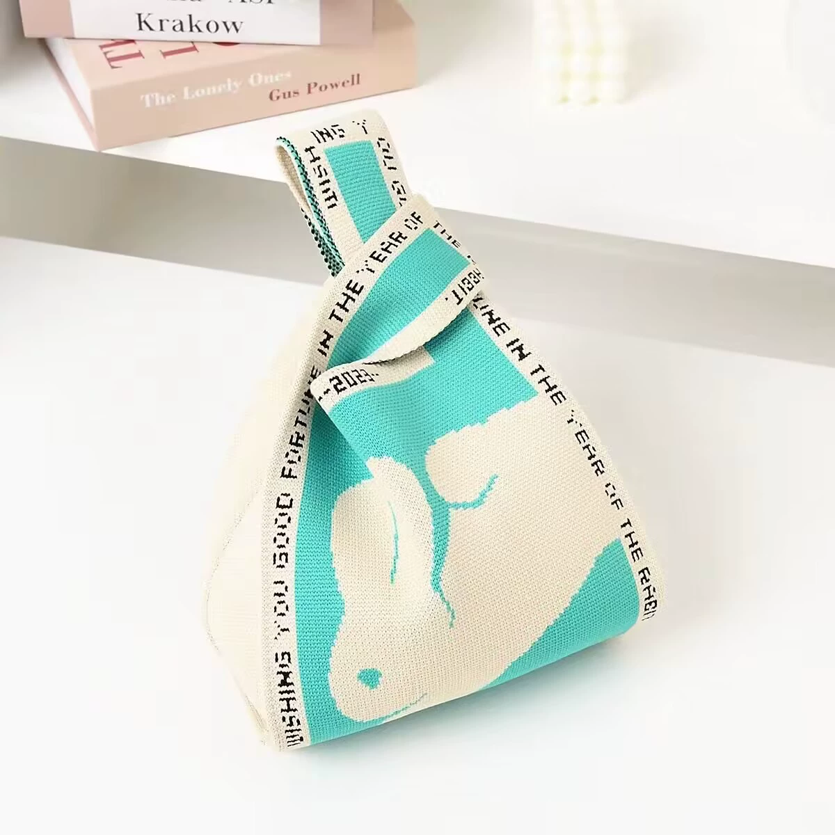 knitted shoulder bag, small handheld organizer purse, rabbit/kangaroo motif, lightweight