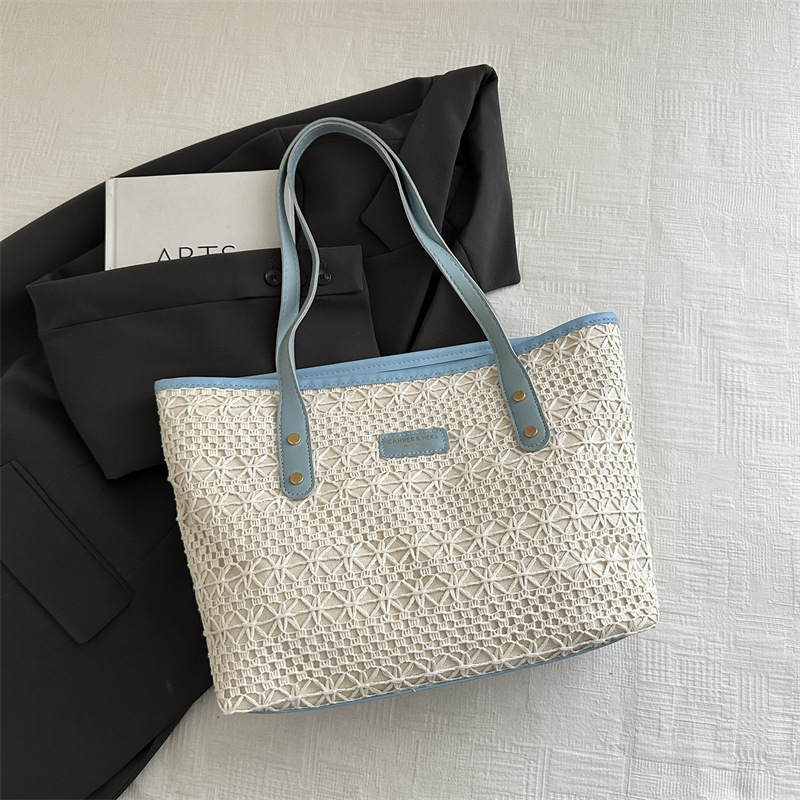 Bolso de moda de gran capacidad tejido 2025 verano de alto valor salvaje bolso de axila de un solo hombro bolso de mujer