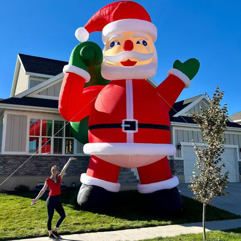 Explosiones de venta super llamativa decoración inflable gigante de alto valor facial resistente al usuario exterior interior universal modelo de aire de Santa Claus