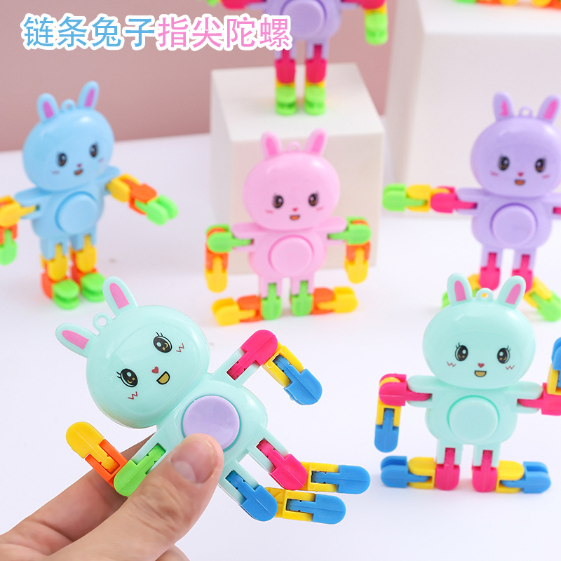 Venta caliente transfronteriza juguetes de descompresión dibujos animados diversos estilos giroscopio cadena de variedad descompresión de la yema del dedo juguetes para niños al por mayor