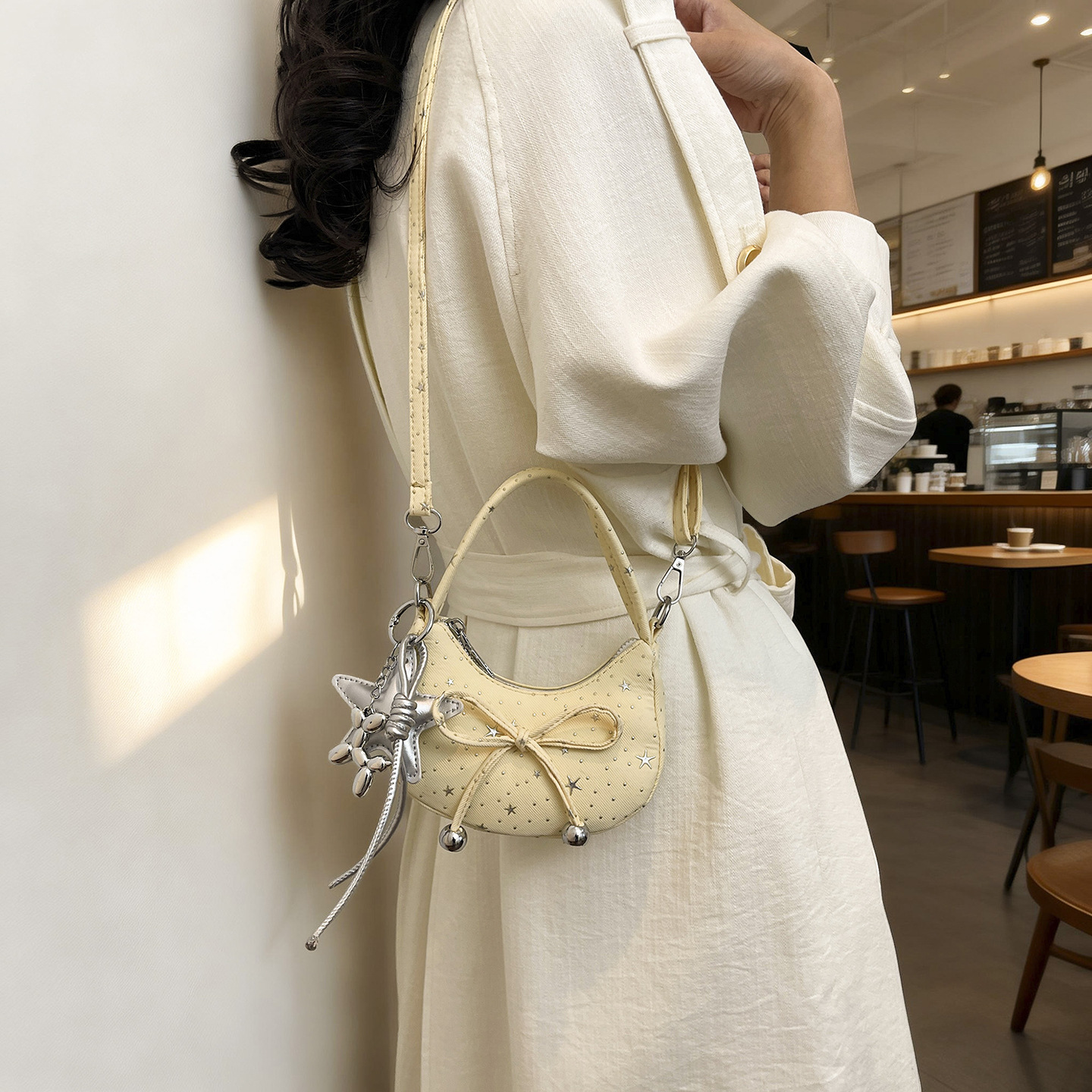 Fresco dulce arco bolso de niña pequeña mini bolso de hombro para niños nuevo bolso de media luna roja de aire extranjero