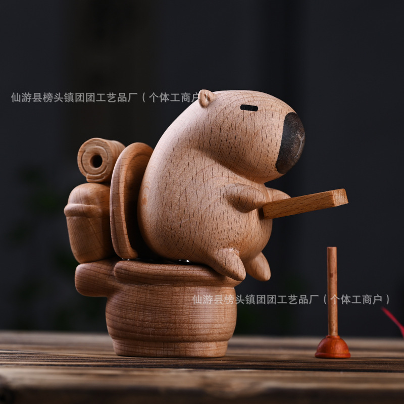 カピバラ便器の実木彫刻磁気はかわいいアイデアを吸収します。|undefined