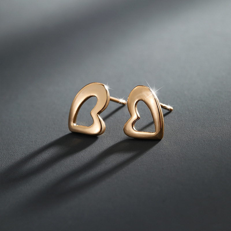 Xupeando joyería de oro pendientes de alto grado temperamento pendientes encantadores nichos femeninos diseño melocotón corazón pendientes joyería de moda