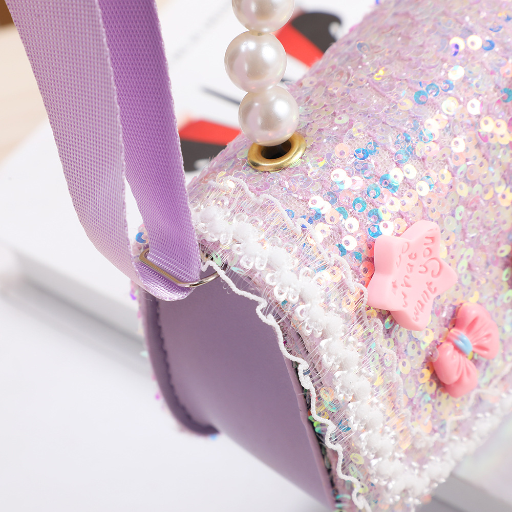 Monedero infantil con lazo, mochila pequeña, bolso bandolera de dibujos animados My Melody para niña, lentejuelas que reducen el peso