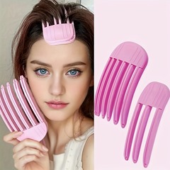 高頭蓋頂ヘアピン髪の髪の根がふわふわしている女性2024の新しい風が怠惰な人の額の前髪の定型神器を櫛にしている