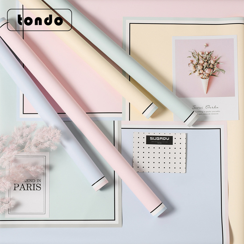 Suministro transfronterizo de papel de regalo estilo coreano, papel para marcos de fotos, papel de borde, papel de regalo impermeable para ramos, venta al por mayor por caja completa