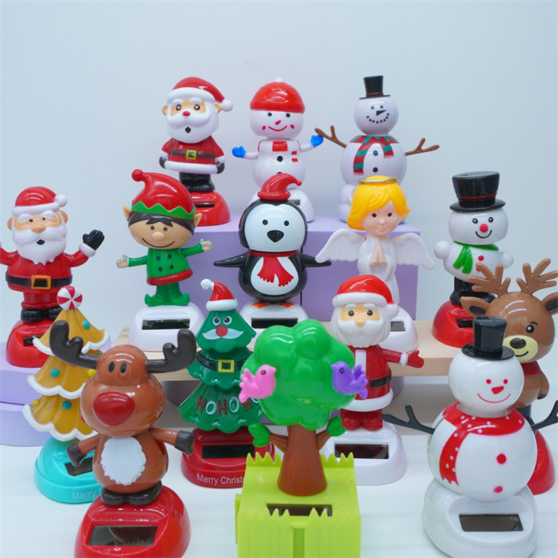 Cross-border Christmas solar energy automatic swing doll car interior shake head decorations creative car car ornaments