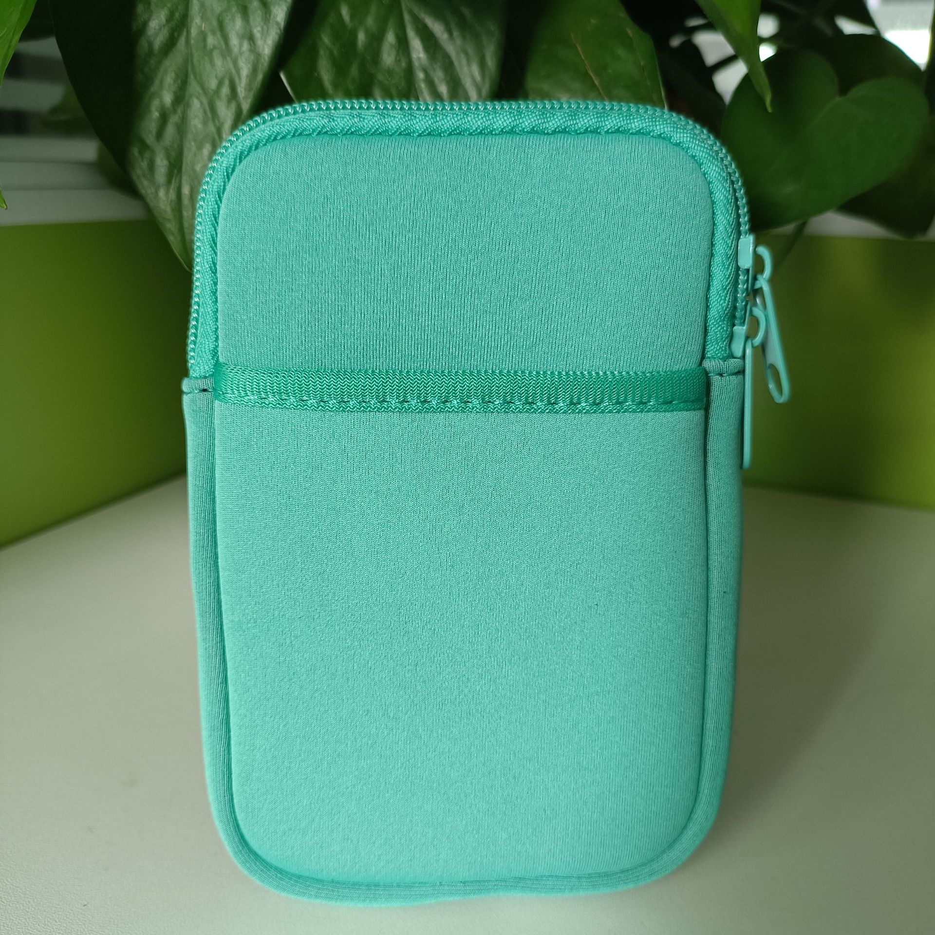 En stock amazon venta caliente material de buceo cubierta de la botella bolsa de la cintura helado taza monedero bolso del teléfono móvil 40oz almacenamiento de gran capacidad