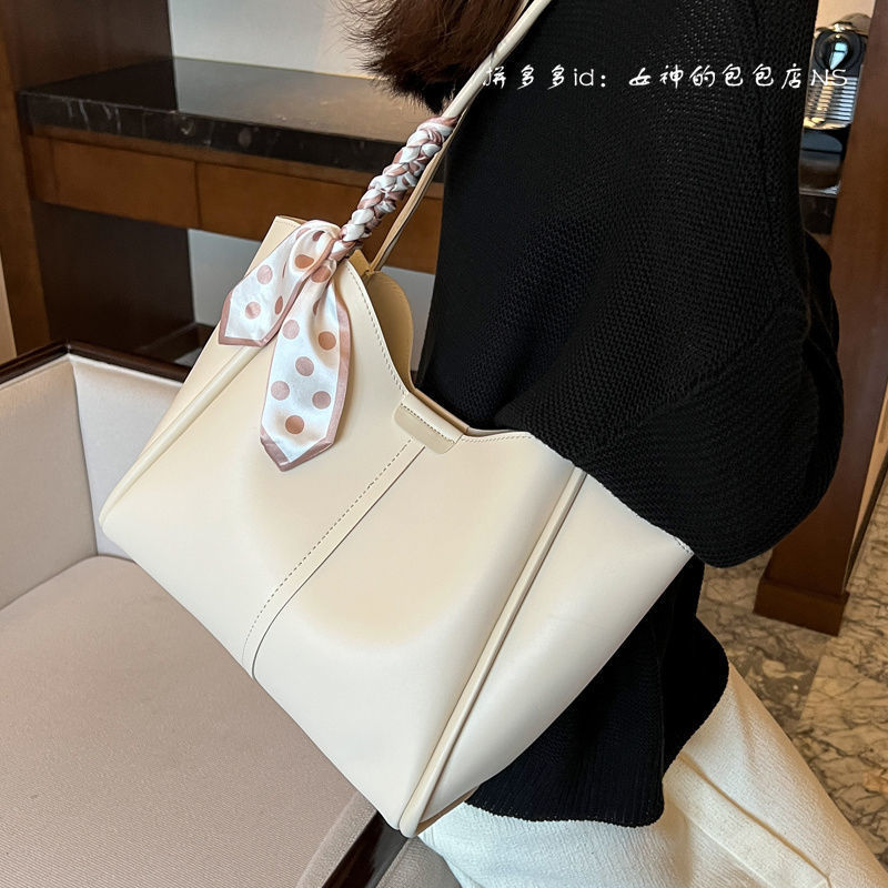 大容量春大型バッグ女性用 2025 新しい多用途ショルダーバッグファッショナブルなハイエンド外国風通勤トートバッグ|undefined