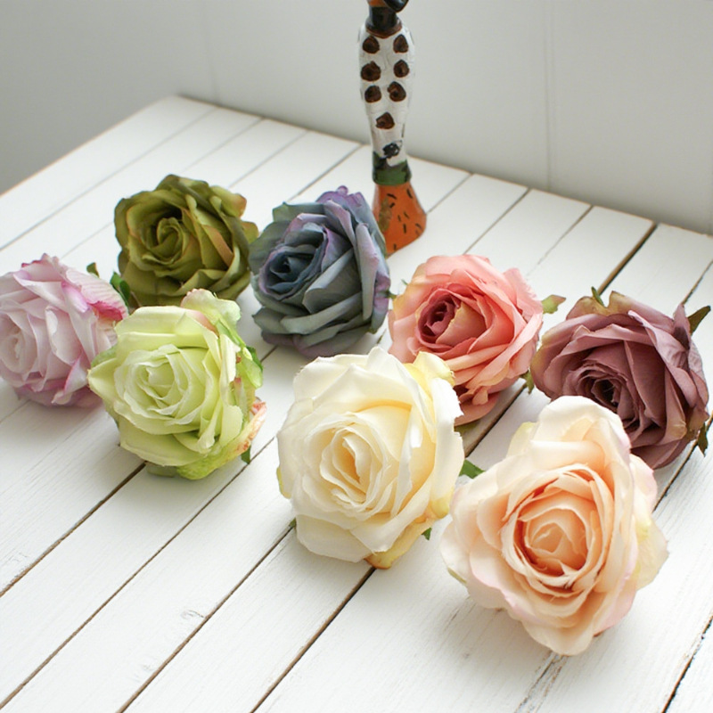 Fábrica directa de simulación de bordes de rosas de seda europea pequeños accesorios de disparo de artículos de boda