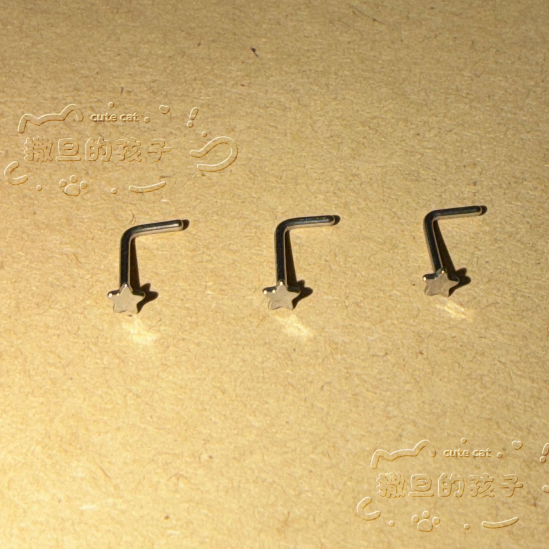 Silver pointed spike labret stud material detail