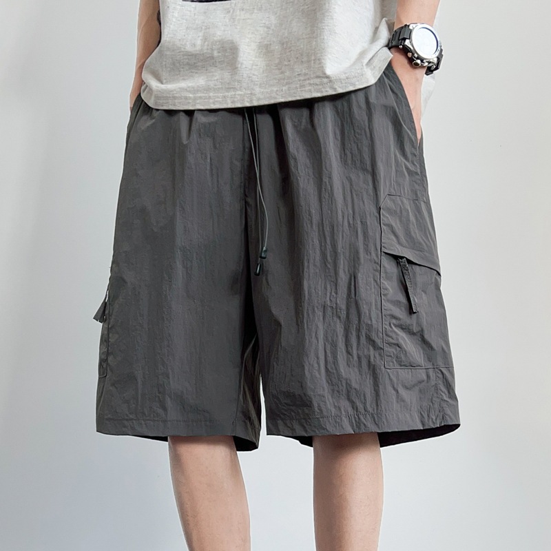 S - 5XL tamaño más grande pantalones de nylon de cinco puntos de hielo seco rápido pantalones cortos de hielo de playa de hombre pantalones casuales delgados pantalones de protección solar hielo