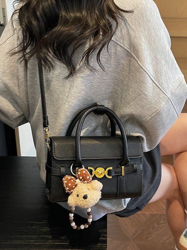 Alta textura de hardware decoración bolso de mano mujer 2026 nuevo popular litchi pattern casual versátil mochila