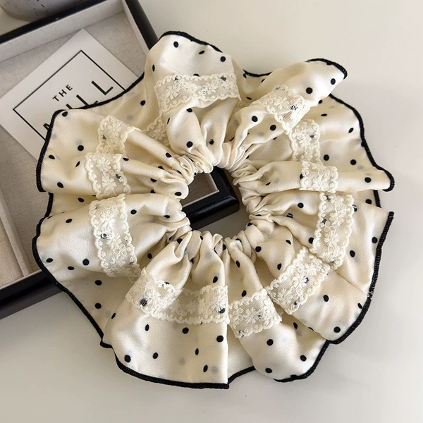 A dot of off-white lace