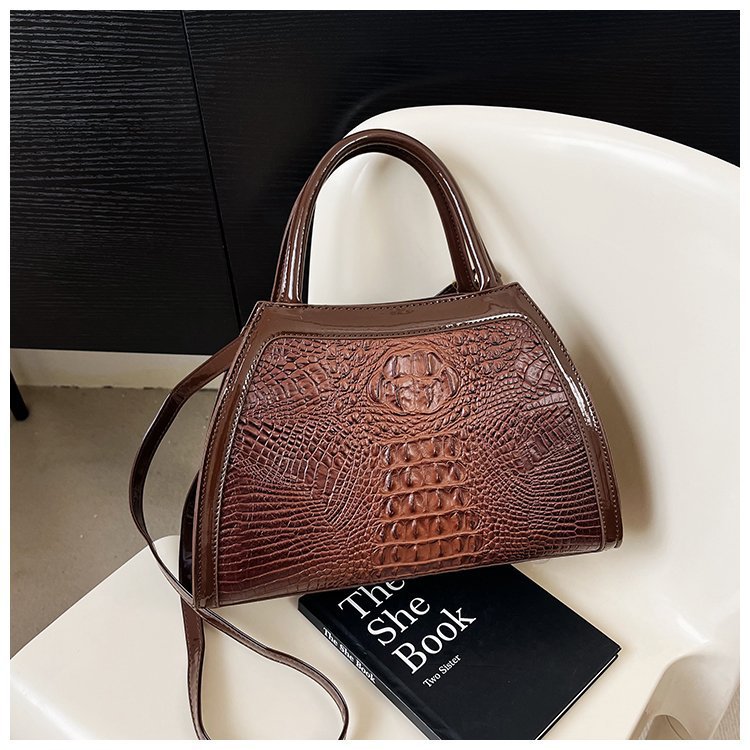 Comercio exterior al por mayor 2023 nuevo estilo retro tendencia bolso de mujer bolso de mensajero de un solo hombro de gran capacidad bolso de color a juego