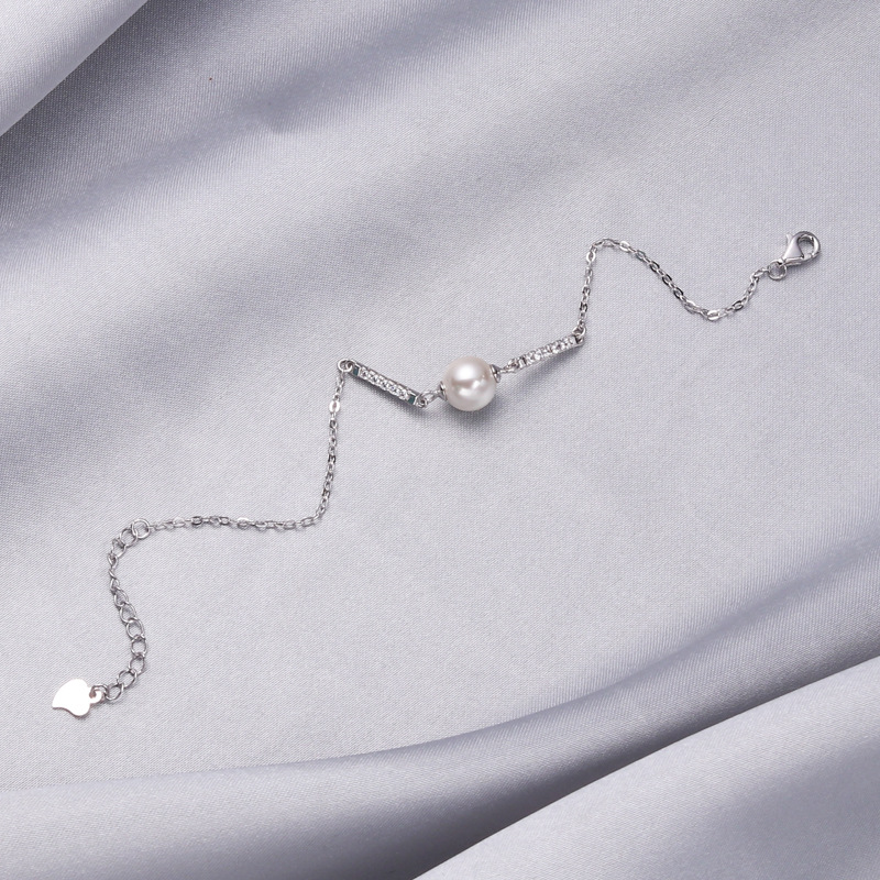 Comercio exterior europeo y americano joyería transfronteriza simple y de moda con incrustaciones de diamantes, cadena de perlas de una sola concha, joyería de mano, pulsera de mujer