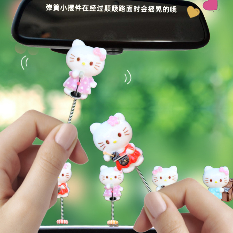 Nuevos productos adorables adornos de automóviles muñecas creativas decoraciones interiores de automóviles primavera sacudiendo la cabeza cabeza cabeza cabeza sala de transmisión directa con mercancías