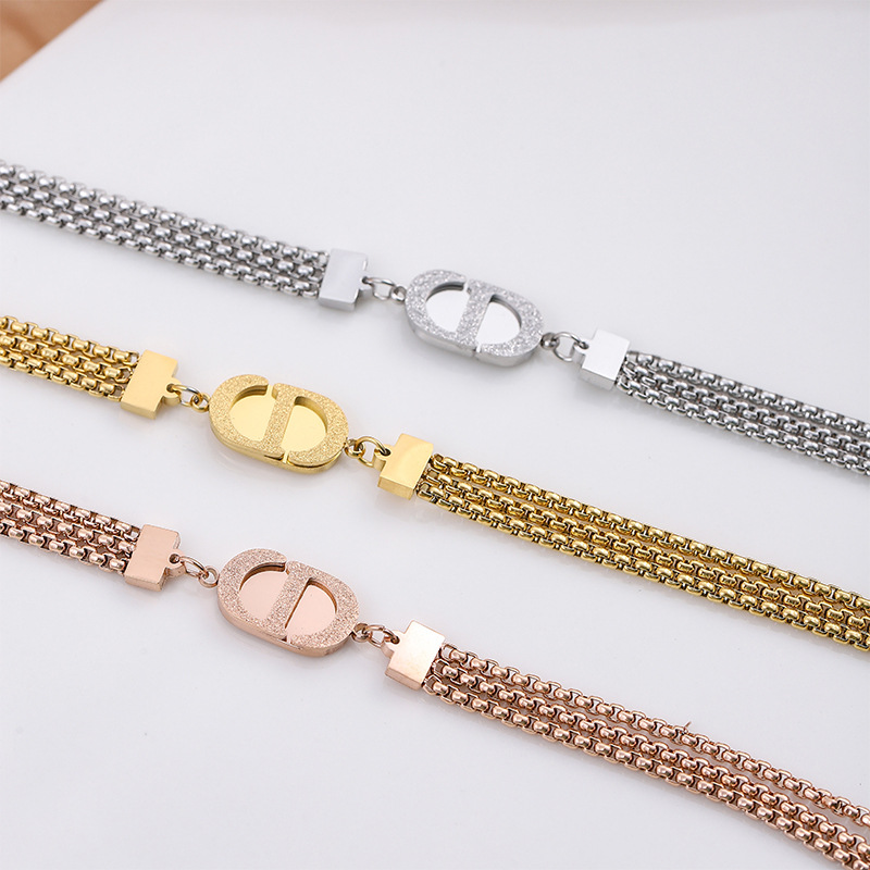 Europa y los Estados Unidos transfronterizos Amazon nuevas letras CD chapado en oro 18K esmerilado tres pulseras de acero de titanio lujoso para mujeres image 1